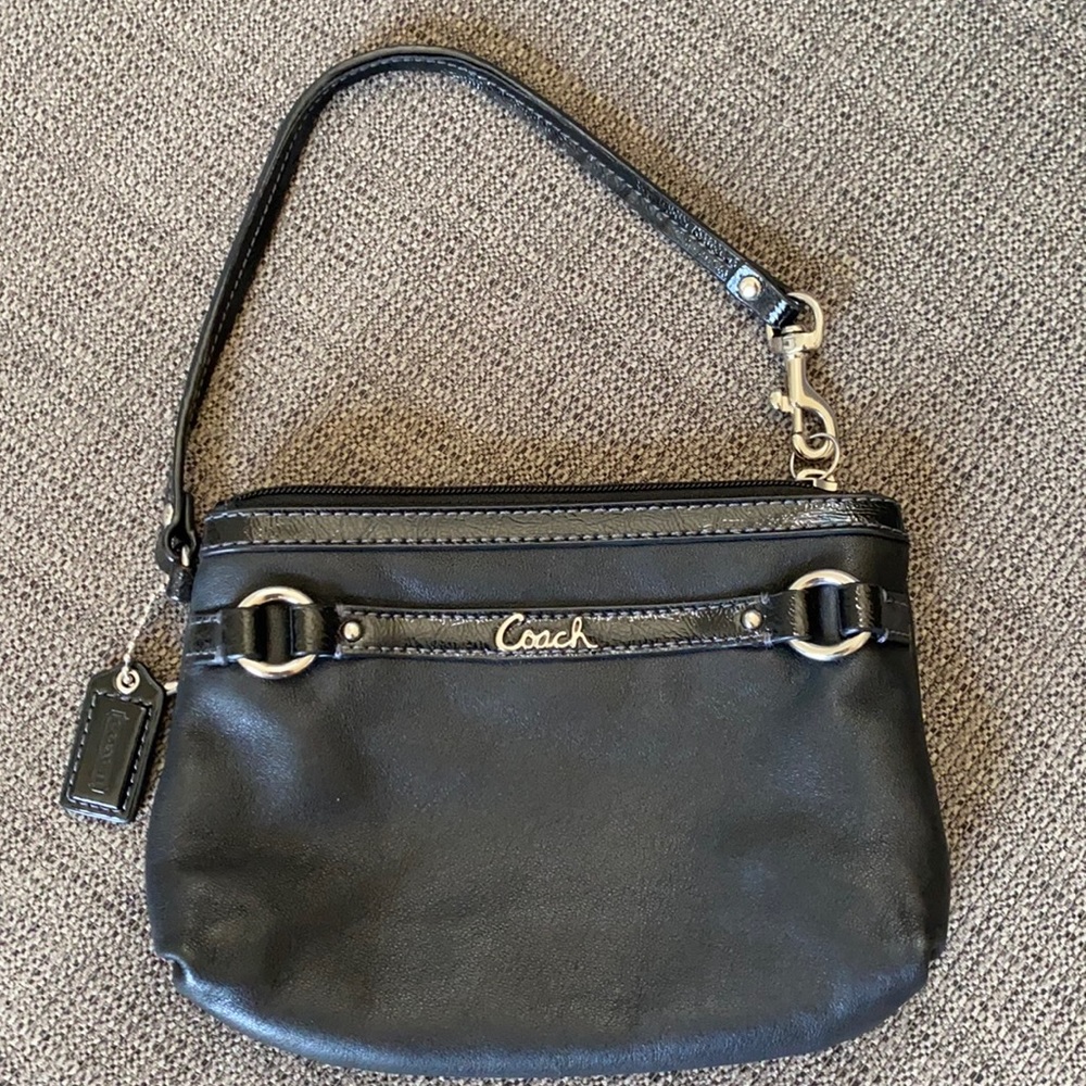 Coach small black leather wristlet.